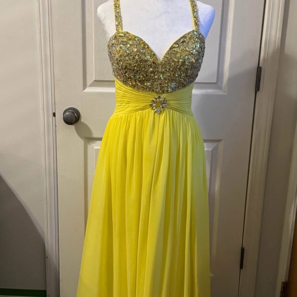 Jaaz couture prom dress. Yellow with gold and clear beaded bodices. size 4